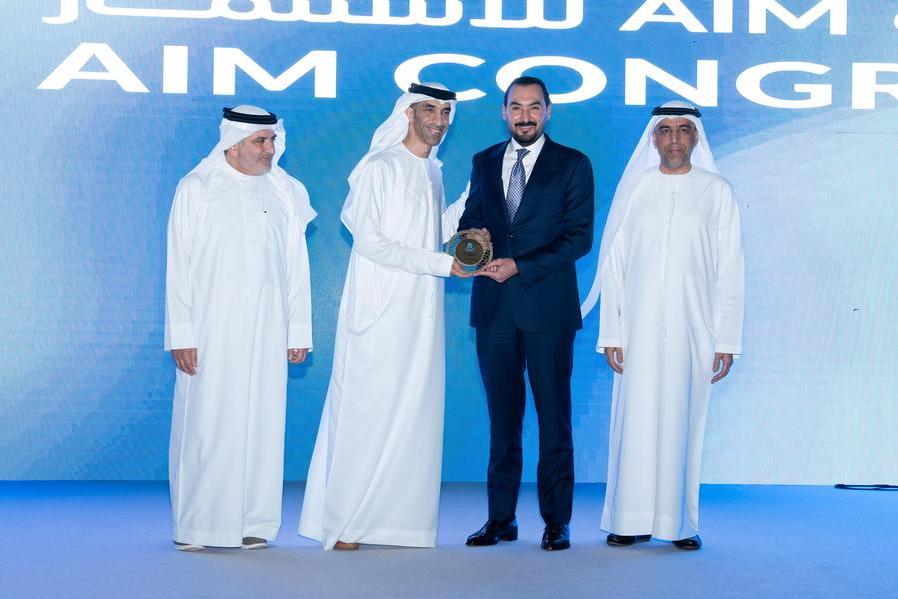 تكريم مصرف التنمية الدولي خلال فعاليات قمة AIM للاستثمار، تقديرًا لدعمه المستمر وشراكته الاستراتيجية