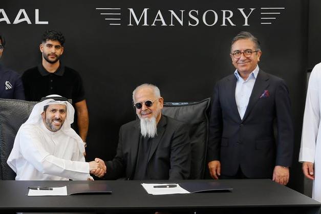 “منصوري” العالمية تبرم شراكة مع “آمال” للانطلاق في عالم العقارات